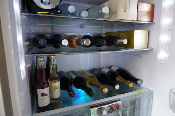 Fridge stocked for a at home wine tasting party