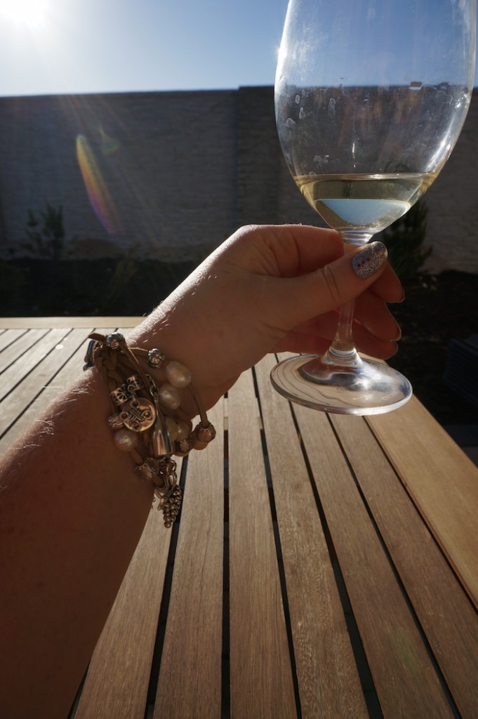 Drinking wine and wearing wine jewelry by Proud Pearls