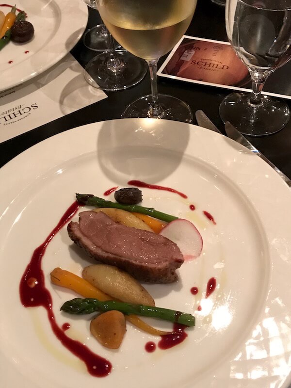 Crispy Skinned Duck Breast with Pommes Chateaux, Baby Spring Vegetables & a Black Cherry Jus - Coco's Restaurant