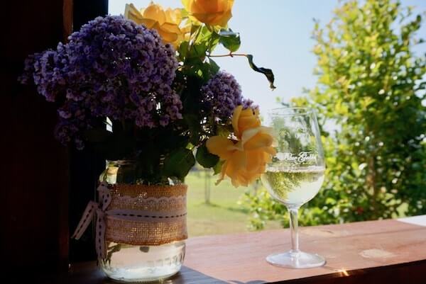 Blue Gables Winery - Glass of Chardonnay & Fresh Flowers