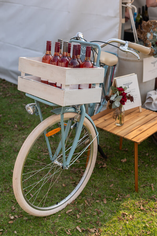 blue-bike-with-wine-in-the-front-basket