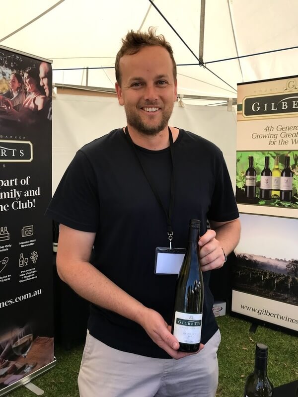 clint-of-gilberts-wines-holding-a-bottle-of-riesling