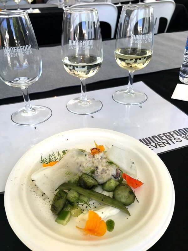glass-of-redgate-wines-sauvignon-blanc-reserve-white-plate-with-cucumbers-three-ways-daikon-crab-and-smoked-yoghurt