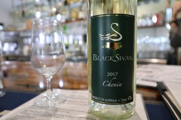 glass-and-bottle-of-chenin-at-black-swan-winery-swan-valley