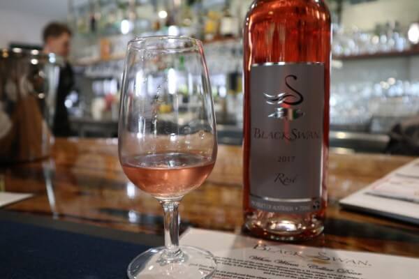 glass-and-bottle-of-rose-at-black-swan-winery-swan-valley