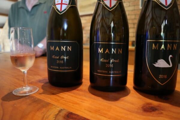 glass-of-mann-rosi-brut-and-three-bottles-at-mann-estate-swan-valley