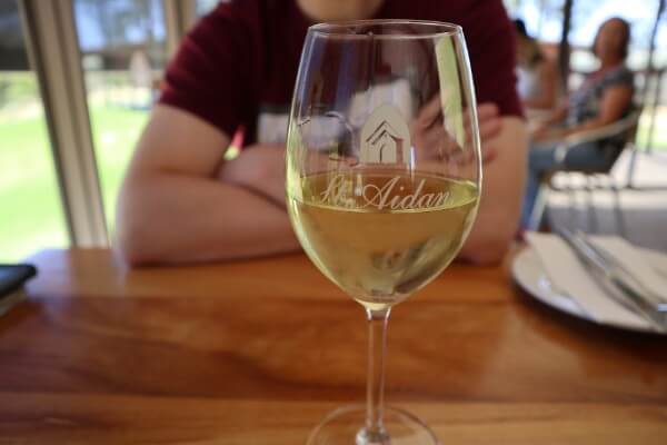 wine glass of chardonnay st aidan winery