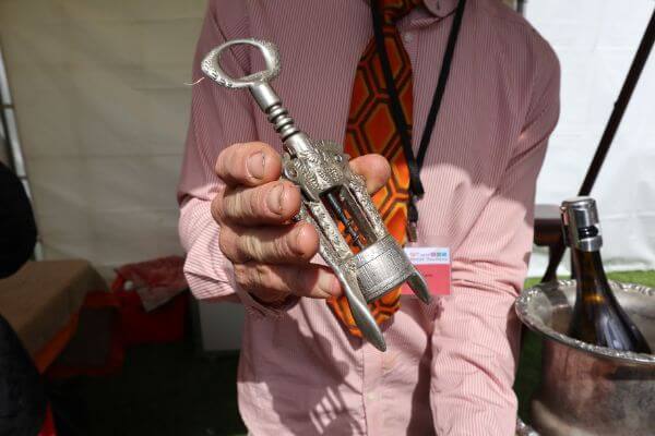 interesting italian corkscrew held by murray from oramje tractor at the albany wine and food festival