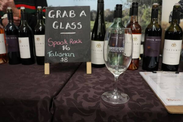 blackboard sign with grab a glass sppok rock or talisman wine at city wine yagan square perth