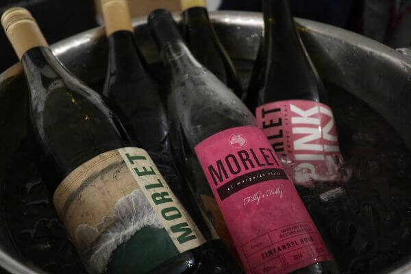 bottles of 2018 pink zin pet nat zinfandel rose and a bottle of chardonnay