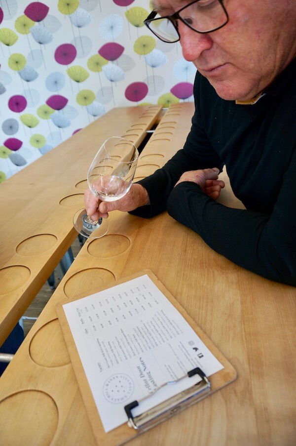 Dad perusing the tasting menu at Goaty Hill Wines - Tamar Valley, Tasmania