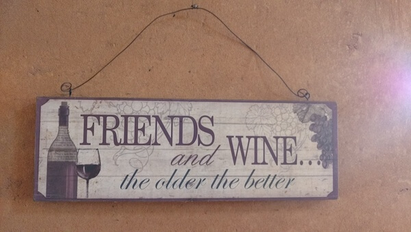 Thomson friends and wine sign
