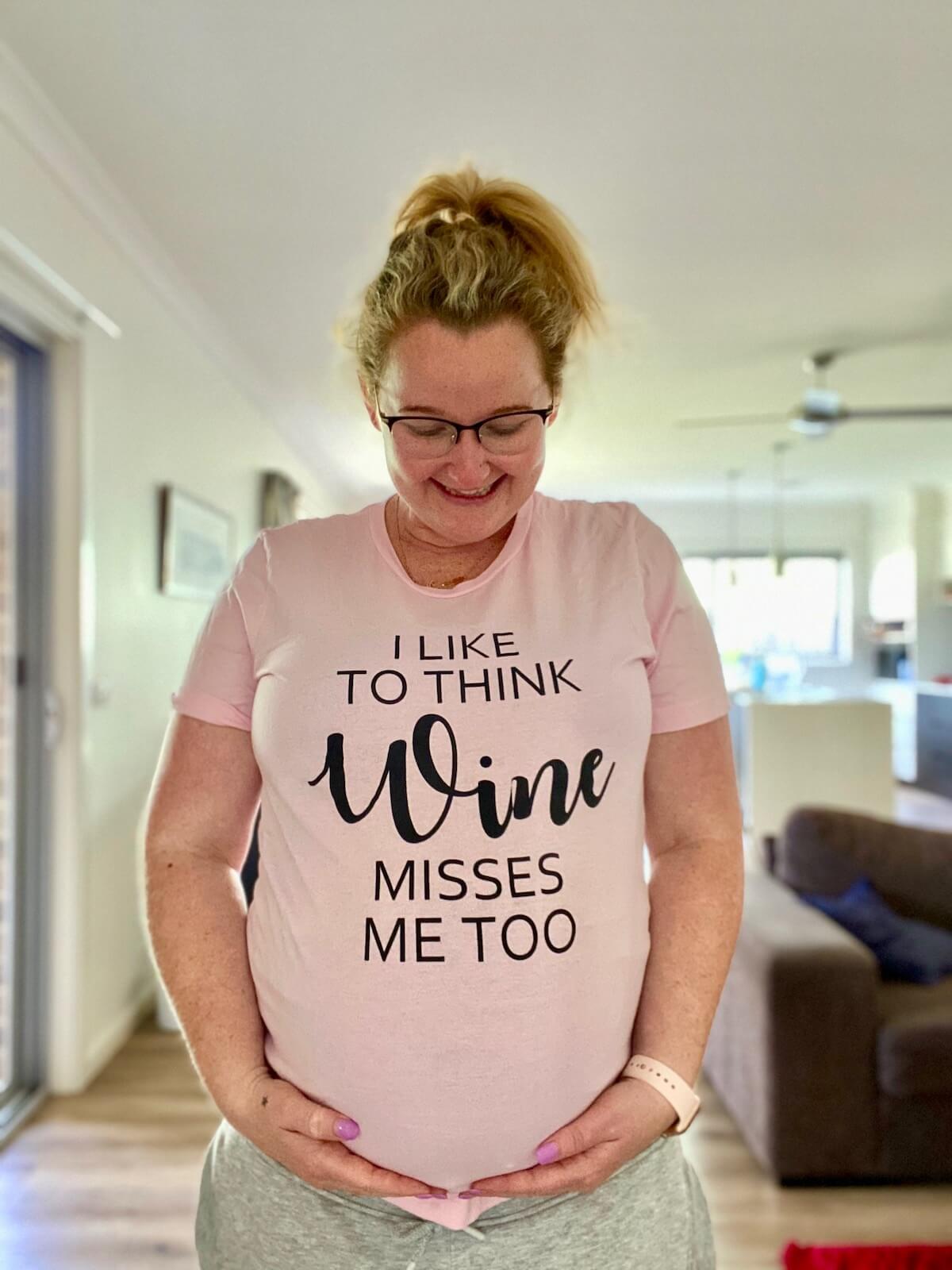 Casey in a i like to think wine misses me t-shirt standing up