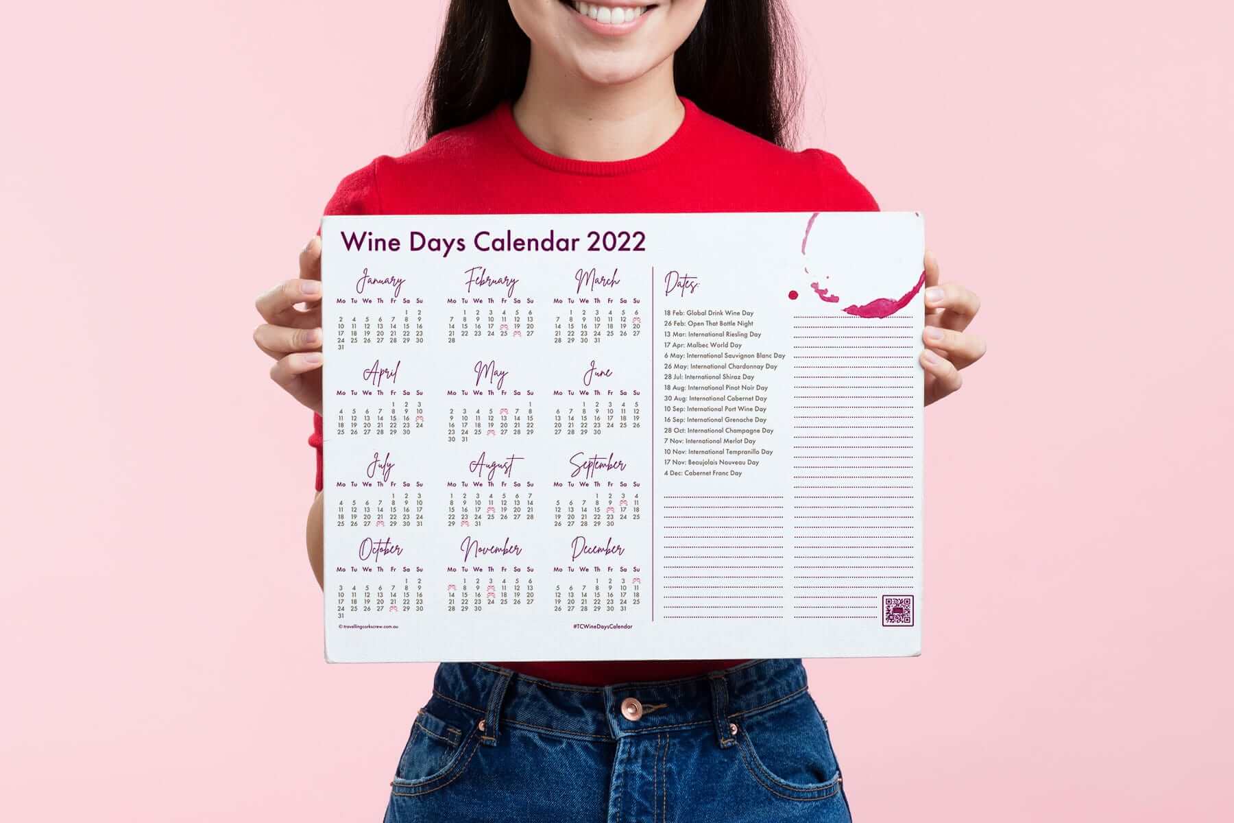 Lady holding the TC Wine Days Calendar 2022