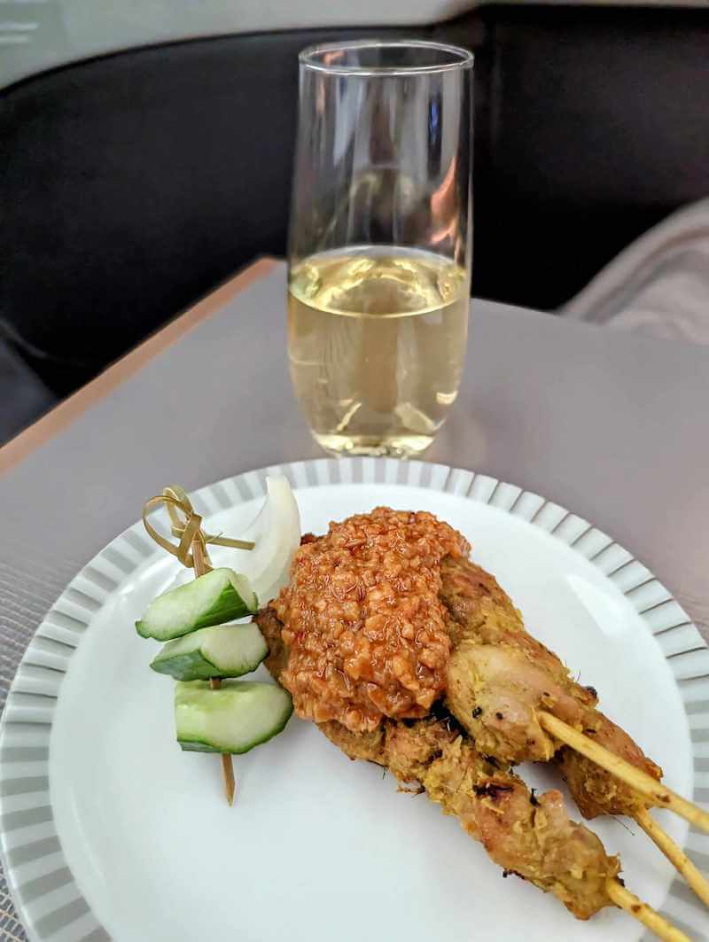Chicken Satay skewers onboard Singapore Airlines Business Class